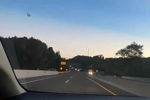Sunset view on the highway with view forest Foto stock