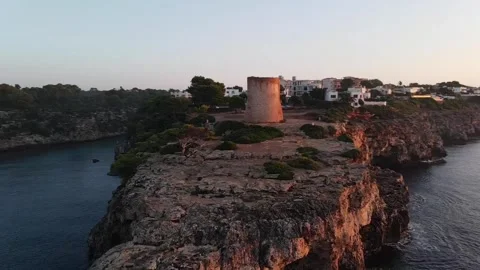 Sunset View of Historic Watchtower at Cala Pi, Mallorca - Aerial Footage Video stock 304235349