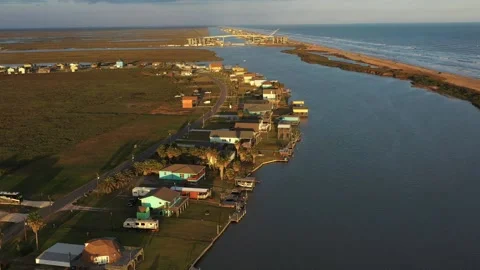 Sunset View of Homes Along the Coast, Gulf of Mexico, Sargent, Texas, USA Stock Footage 145943406