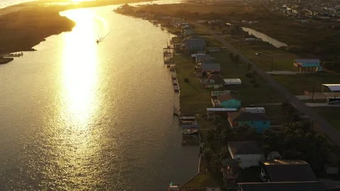 Sunset View of Homes Along the Coast, Gulf of Mexico, Sargent, Texas, USA Stock Footage 145943436