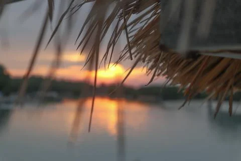 Sunset view from the hut on the beach Stock Photos