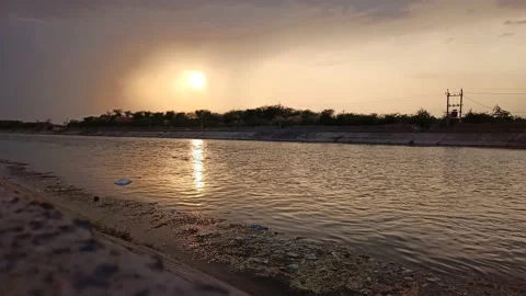 Sunset view. India canal. Beautiful sunset in India Stock Footage