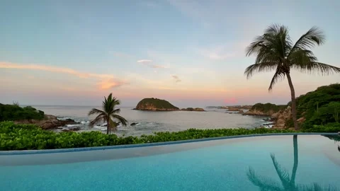 Sunset view from infinity pool, Huatulco Mexico Stock Footage 326696845