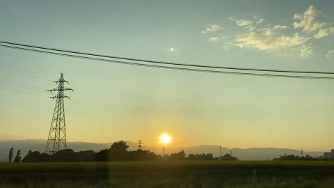 Sunset view inside a driving car Stock Footage 136712879