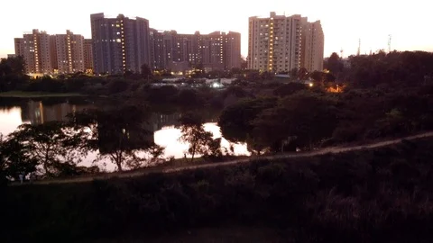 Sunset view of lake front buildings Stock Footage 125074981