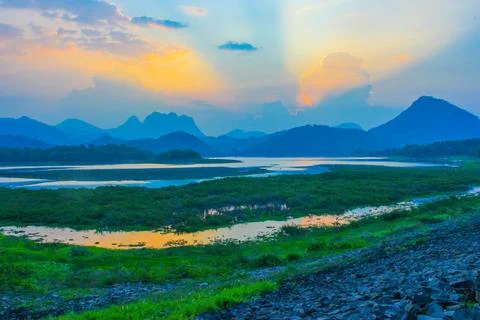 Sunset view on the lake Stock Photos