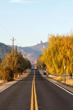 Sunset view of Lambert Road next to Smith Rock State Park in the background Stock Photos