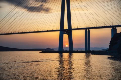 Sunset view of long cable-stayed bridge in Vladivostok, Far East of Russia Stock Photos
