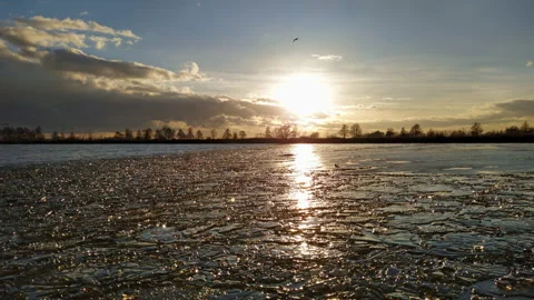 Sunset view on melting ice lake Stock Footage 147151303