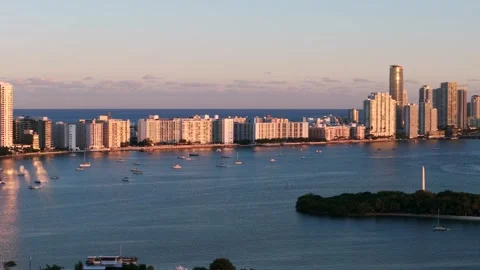 Sunset view of Miami Beach. Serene scene with high-rise buildings along Stock Footage 295551889