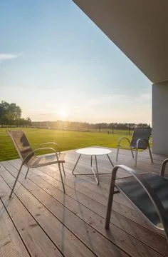 Sunset view from the modern patio Stock Photos