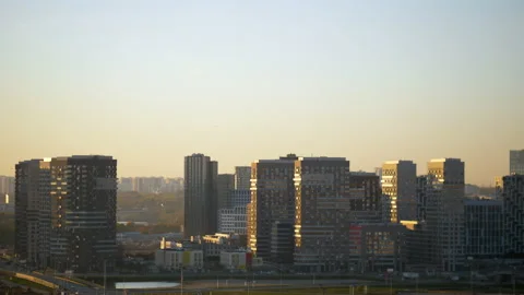 Sunset view of a modern urban area. Modern urban housing. Stock Footage 163373760