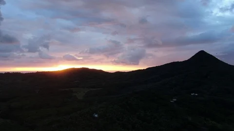 Sunset view with mountains on background at Mauritius Stock Footage 120427308