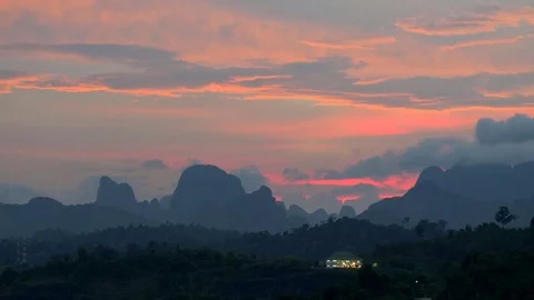 Sunset view of mountains in Khao Sok national park, Thailand. Panning shot Stock Footage 83987190
