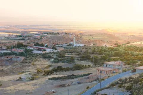 Sunset view from mountaintop for a mosque and trees turkey like in algeria Stock Photos