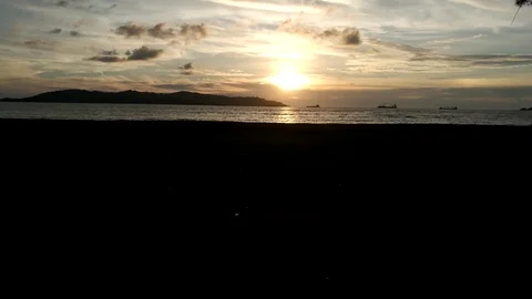 Sunset view with moving cloud above an island. Stock Footage 87245569