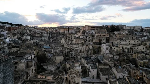 Sunset view of old town architecture of matera,italy,night illuminated timelapse Stock Footage 125219644