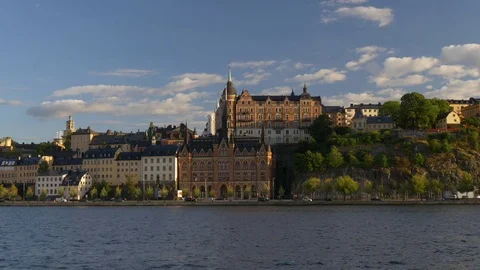 Sunset view of the Old Town pier architecture in Sodermalm district of Stockholm 스톡 동영상 79354629