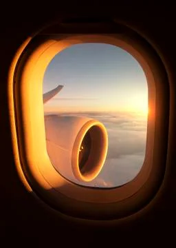 Sunset View Out of Plane Window Stock Photos