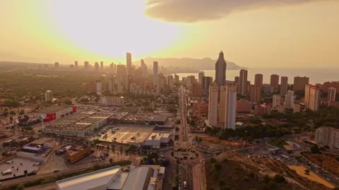 Sunset view over a city with tall buildings and a bay in the background dur.. Stock Footage 340192791