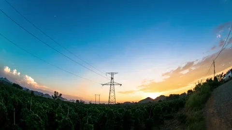 Sunset view over farming fields and darkening sky.12s Stock Footage 41540678