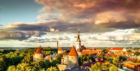 Sunset view over the medieval roofs of Tallinn in Estonia Stock Photos