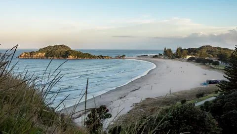 Sunset view over the mount main beach from halfway up mount manganui in tauranga Stock Photos
