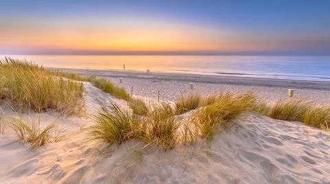 Sunset View over ocean from dune in Zeeland Stock Photos