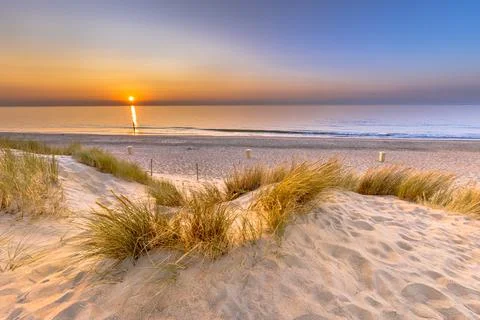 Sunset View over ocean from dune in Zeeland Foto stock