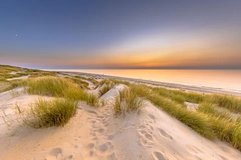 Sunset View over ocean from dune in Zeeland Stock Photos