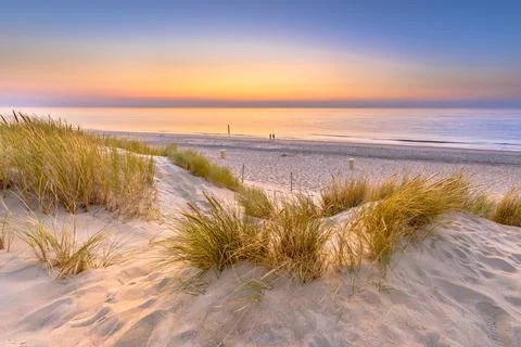 Sunset View over ocean from dune in Zeeland Stock Photos