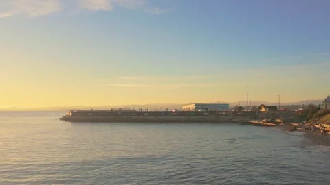 Sunset view over Ogden Point Terminal Pier in Victoria, British Columbia, Canada Stock Footage 294951344