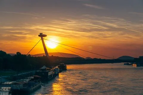 Sunset view over the river by the tower Stock Photos