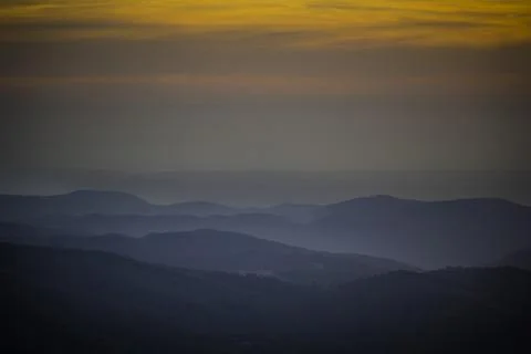 Sunset view over the rolling mountains and hills of serra de Monchique Stock Photos