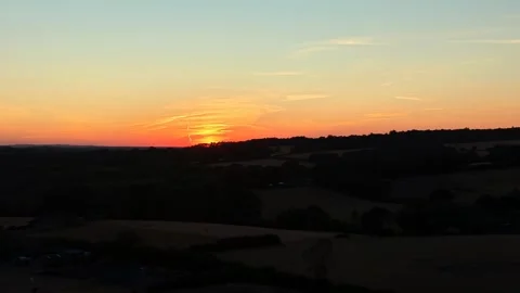 Sunset View Over Rural Nature Landscape With Orange Yellow And Blue Sky Vidéo 341730608