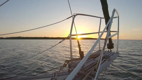 Sunset view over Sailboat’s Bowsprit while Anchored off of Sanibel Island Stock Footage 178487718