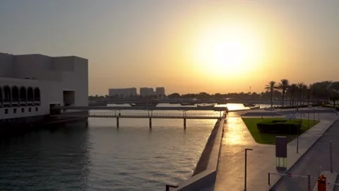 Sunset view over the waterfront promenade and modern bridge Stock Footage 340502489