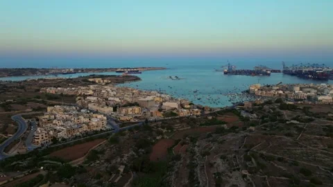 Sunset view of port and Birzebbuga city. Boats, marina. Malta island Video stock 278892734