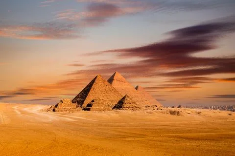 Sunset view of Pyramid complex of Giza, in Cairo, Egypt. Stock Photos