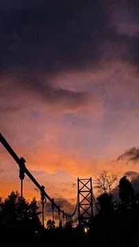 Sunset view on a reddish sky bridge Stock Photos