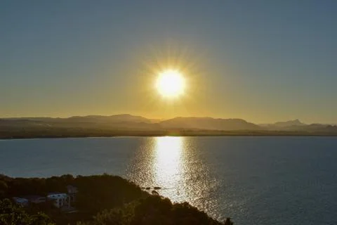 Sunset view with reflection on the sea Stock Photos