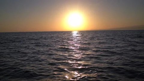 Sunset view with reflection on sea waves Stock Footage 136349485