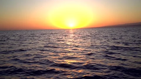 Sunset view with reflection on sea waves Stock Footage 136352259