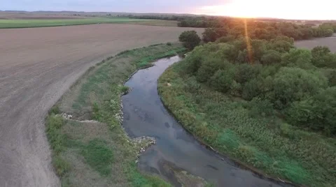 Sunset View of River and Fields Stock Footage 64978110