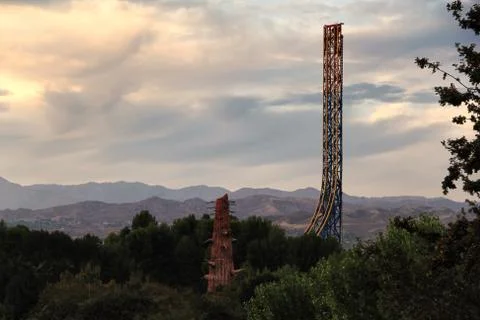 Sunset view of a roller coaster and the hills in California Stock Photos