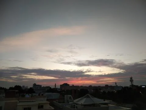 The sunset view with saffron sky Stock Photos