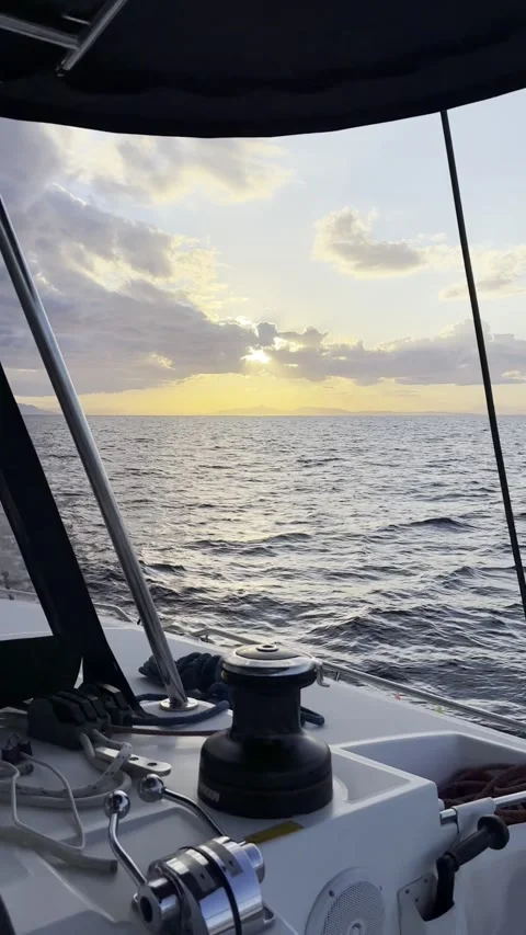 Sunset View from Sailing Catamaran Helm in the Aegean Sea Stock Footage 336965050