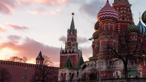 Sunset view of Saint Basil Cathedral and Spasskaya Tower on Red Square. Moscow Stock Footage 105351354