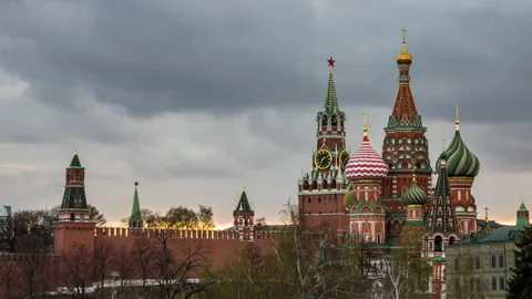 Sunset view of Saint Basil Cathedral and Spasskaya Tower on Red Square. Mosco Stock Footage 154396641