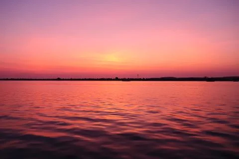 SUNSET VIEW FROM SEA SHORE Stock Photos